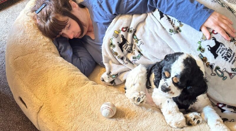 Mom and dog in human dog bed